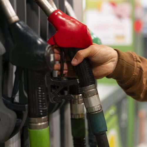 side-view-man-gas-station