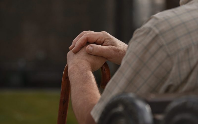 side-view-old-man-sitting-bench